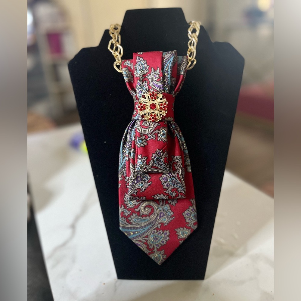 Elegant Red Paisley Tie Necklace with red jeweled brooch..